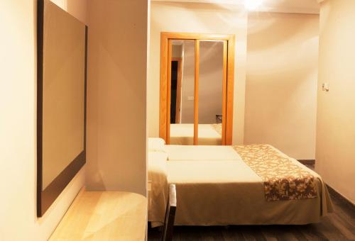 Habitación Familiar del hotel Universal. Foto 1