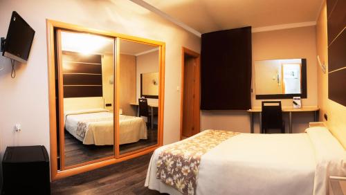 Habitación Familiar del hotel Universal. Foto 6