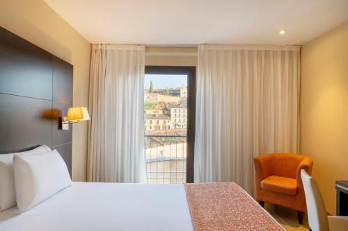 Habitación Doble con vistas a la ciudad - 1 o 2 camas del hotel Eurostars Plaza Acueducto. Foto 2