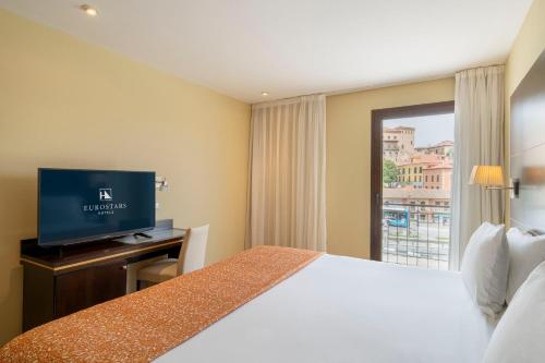 Habitación Doble con cama supletoria del hotel Eurostars Plaza Acueducto