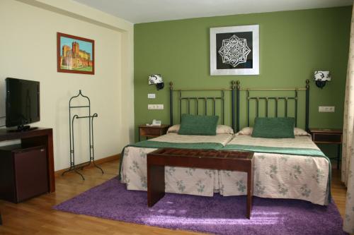 Habitación Triple del hotel Spa La Casa Mudéjar. Foto 1