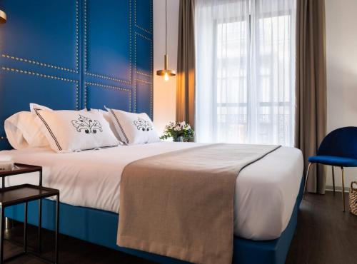 Apartamento con vistas a la ciudad del hotel Casa Sevilla 1920 Suites By Época. Foto 9