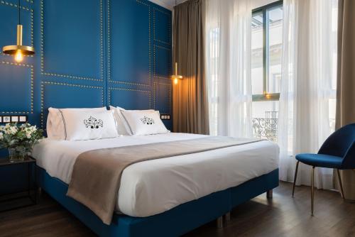 Apartamento con vistas a la ciudad del hotel Casa Sevilla 1920 Suites By Época. Foto 14