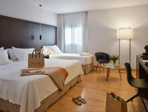 Habitación Doble con cama supletoria del hotel Fernando III. Foto 4