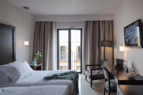 Habitación (1 o 2 adultos) - 1 o 2 camas del hotel Rey Alfonso X. Foto 12