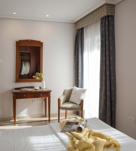 Habitación (1 o 2 adultos) - 1 o 2 camas del hotel Rey Alfonso X. Foto 15
