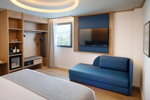 Habitación Familiar del hotel Occidental Santa Cruz Contemporáneo. Foto 4