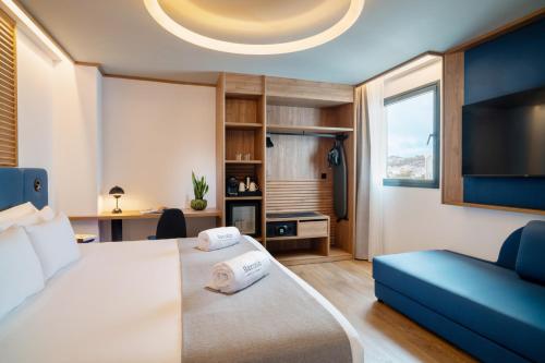 Habitación Familiar del hotel Occidental Santa Cruz Contemporáneo. Foto 5