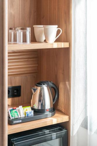 Habitación Familiar del hotel Occidental Santa Cruz Contemporáneo. Foto 10