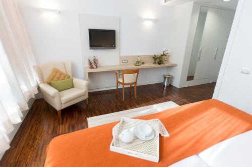 Habitación Doble Confort del hotel Escuela Santa Cruz. Foto 10