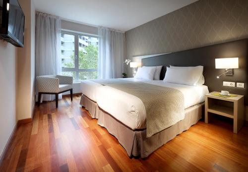Habitación Doble con aparcamiento del hotel Exe Zaragoza Wtc. Foto 1