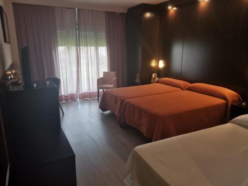 Habitación Triple Estándar del hotel Acosta Centro