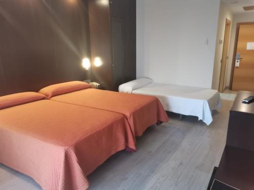 Habitación Triple Estándar del hotel Acosta Centro. Foto 1