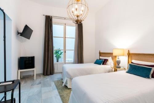 Habitación Doble del hotel Hostal Roomsole. Foto 18