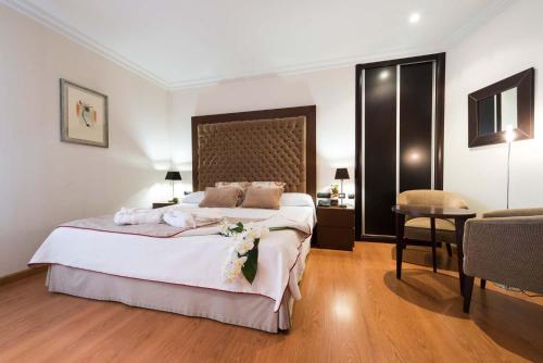 Habitación Doble Deluxe con bañera de hidromasaje del hotel Fc Infantas De Leon