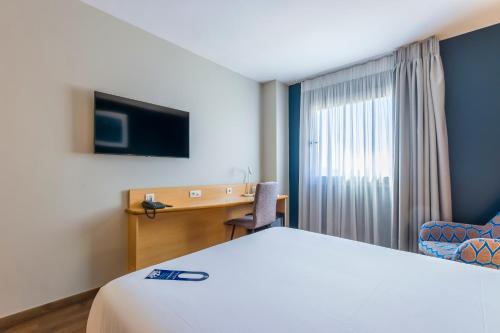 Habitación Doble del hotel Travelodge Madrid Alcalá de Henares. Foto 6