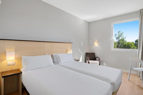 Habitación Doble Estándar - 2 camas del hotel B&B Madrid Pinar de las Rozas. Foto 2