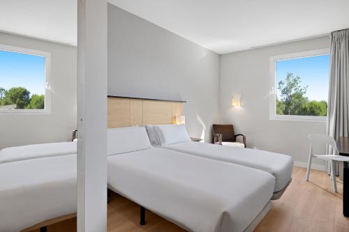 Habitación Doble Estándar - 2 camas del hotel B&B Madrid Pinar de las Rozas. Foto 4