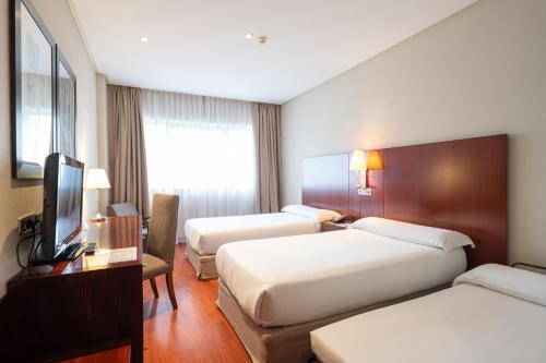 Habitación Doble con cama supletoria - 2 camas del hotel Gran Attica21 Las Rozas. Foto 1