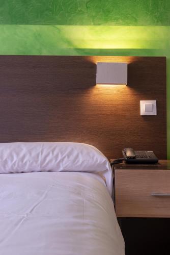 Habitación Triple del hotel Apartamentos Recoletos. Foto 3