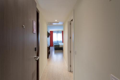 Habitación Triple del hotel Apartamentos Recoletos. Foto 4