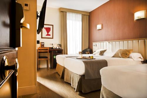 Habitación Triple del hotel Los Condes