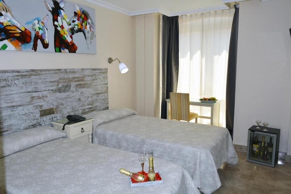 Habitación doble, 2 camas individuales del hotel Caballero Errante. Foto 1