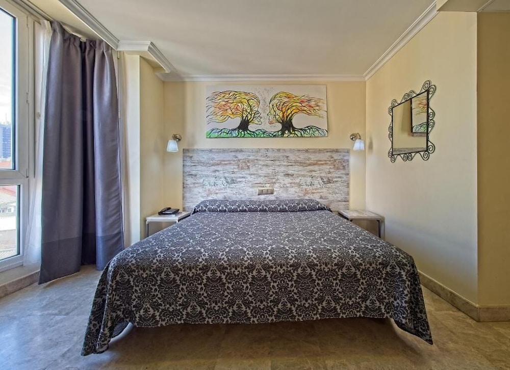 Habitación individual amplia del hotel Caballero Errante