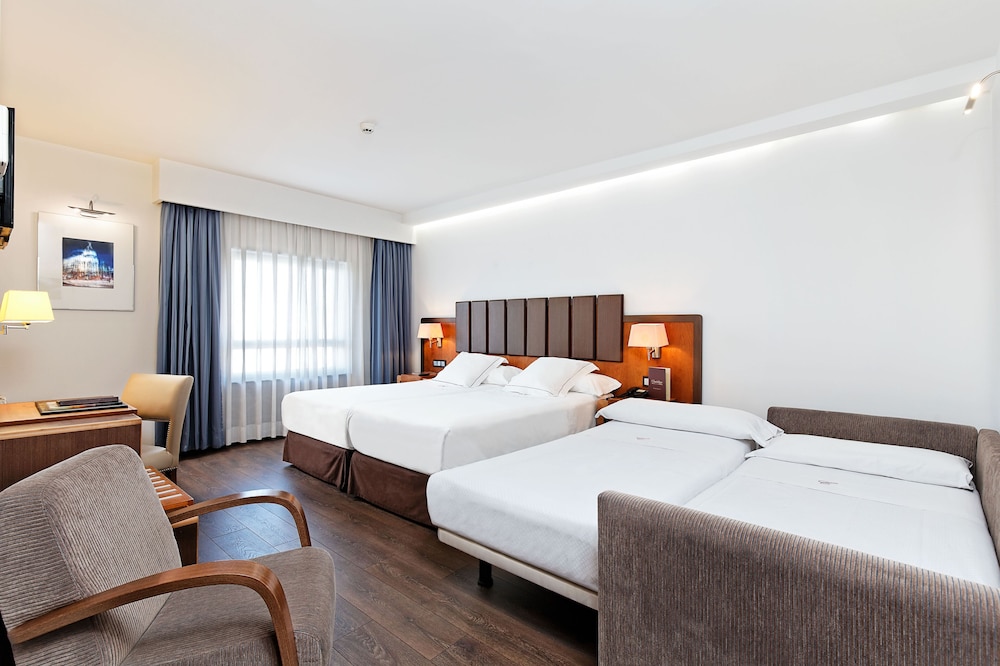 Habitación cuádruple del hotel Claridge Madrid