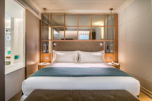 Habitación familiar Comunicada 2 Camas individuales 2 Camas king del hotel Barceló Emperatriz. Foto 6