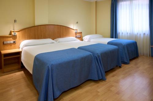 Habitación Triple del hotel II Castillas Madrid