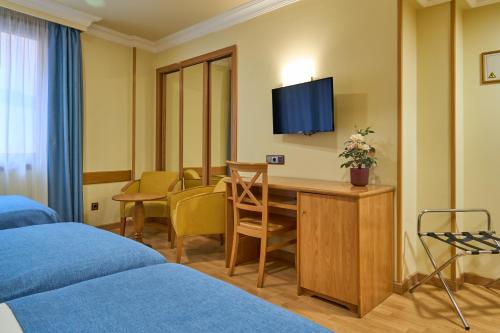 Habitación Triple del hotel II Castillas Madrid. Foto 3