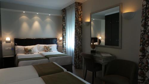 Habitación Familiar del hotel Moderno. Foto 3