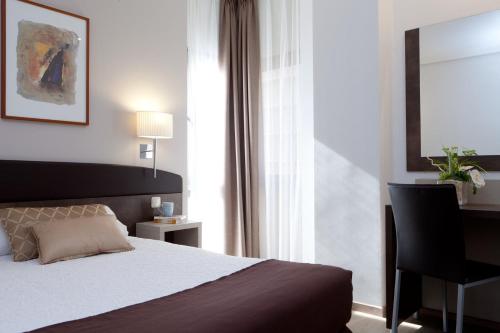 Habitación Doble con cama supletoria (2 adultos + 1 niño menor de 12) del hotel Villamadrid. Foto 4