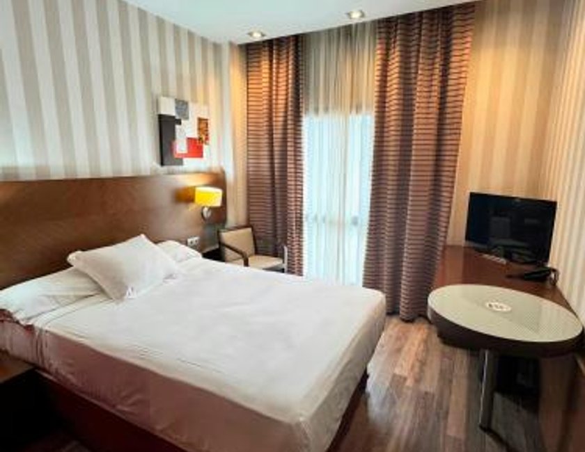 Habitación Individual del hotel Sercotel las Artes Pinto. Foto 1