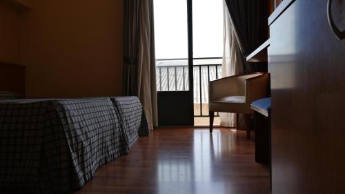 Habitación Triple Básica del hotel Rusadir. Foto 3