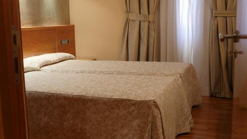 Habitación Cuádruple Clásica del hotel Rusadir. Foto 3