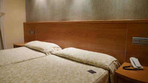 Habitación Cuádruple Clásica del hotel Rusadir. Foto 4