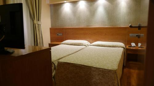 Habitación Cuádruple Clásica del hotel Rusadir. Foto 5