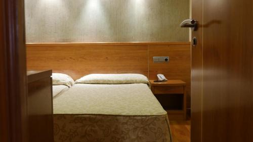 Habitación Cuádruple Clásica del hotel Rusadir. Foto 6
