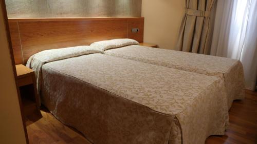 Habitación Cuádruple Clásica del hotel Rusadir. Foto 11