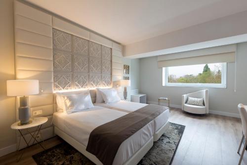 Habitación Doble con cama supletoria - 1 o 2 camas del hotel Tres Reyes Pamplona. Foto 1