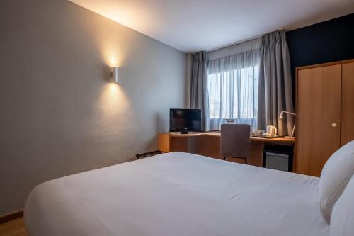 Habitación Familiar Pequeña del hotel Travelodge Murcia. Foto 5