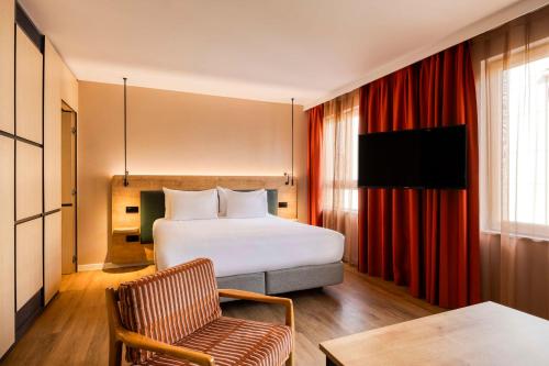 Habitación Deluxe con cama extragrande del hotel Hilton Garden Inn Brussels City Centre