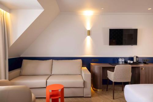 Habitación Cuádruple Clásica del hotel THE AUGUSTIN. Foto 1
