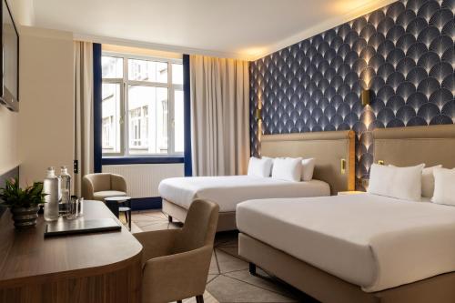Habitación Cuádruple Clásica del hotel THE AUGUSTIN. Foto 13