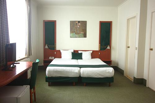 Habitación Doble Estándar - 2 camas del hotel Le Dome. Foto 9