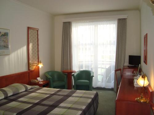 Habitación Doble Estándar del hotel Le Dome. Foto 2