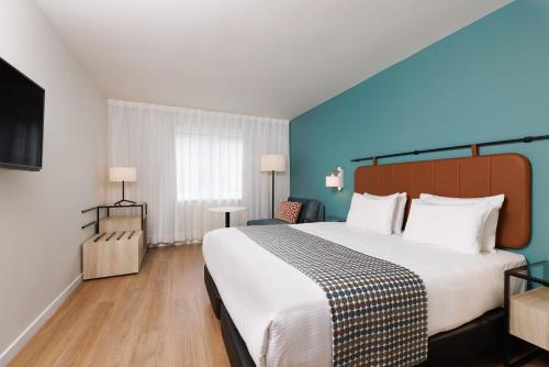 Habitación Triple del hotel Exe Vienna. Foto 2