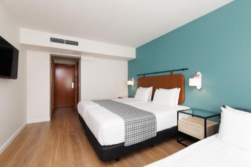 Habitación Triple del hotel Exe Vienna. Foto 4